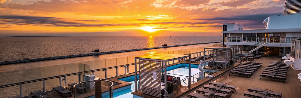 Sunset setting onboard a Silversea cruise all-inclusive cruise - The Complete First-Timer’s Guide to Luxury Cruising