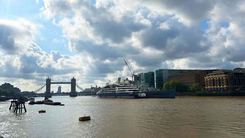 Ponant-Le-Bellot-docked-in-London-at-London-Bridge-next-to-HMS-Belfast-on-the-Thames