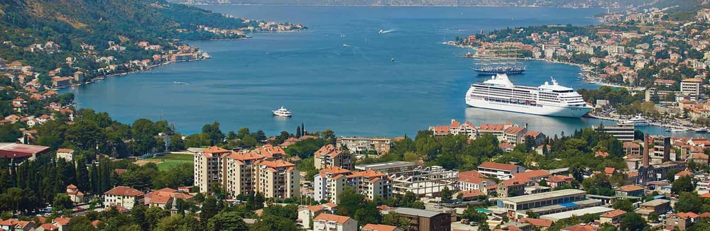 Regent-Seven-Seas-Cruises-Mariner-docked-in-Kotor-Regent-Seven-Seas-Itineraries-&-Excursions
