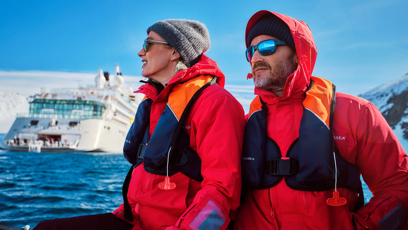 Silversea Expeditions where to go - guests on a Zodiac tip in Antarctica