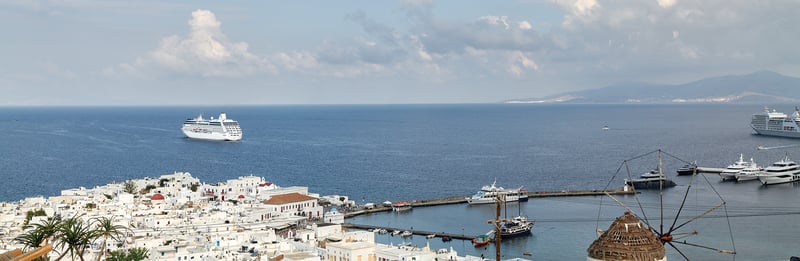 Oceania Cruises Regatta ship in Mykonos in Greece - Oceania vs Azamara - Which Cruise Line Should You Choose