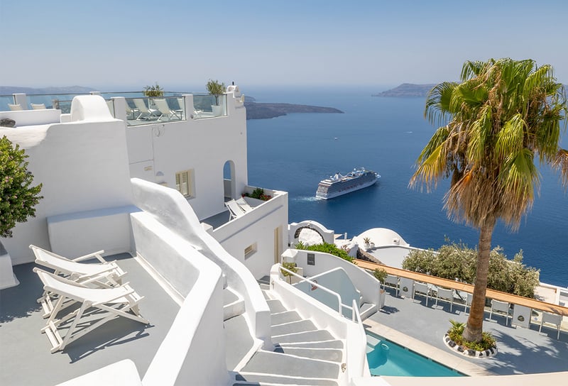Riviera docked in Santorini - The Complete First-Timer’s Guide to Luxury Cruising