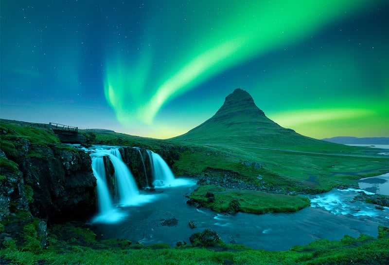 Iceland landscape with incredible sky with Northern lights over Kirkjufellsfoss waterfall, Aurora borealis - Northern Lights Cruises 2026 When, Where and How to See the Aurora