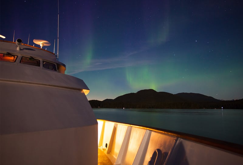 Northern Lights above ship sailings in Norway - Northern Lights Cruises 2026 When, Where and How to See the Aurora