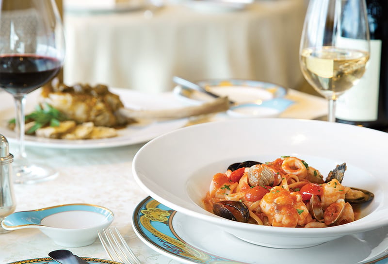 Oceania Cruises Fine Dining Restaurant Toscana Cioppino - What is a Six-Star Cruise Ultra-Luxury Cruising Explained