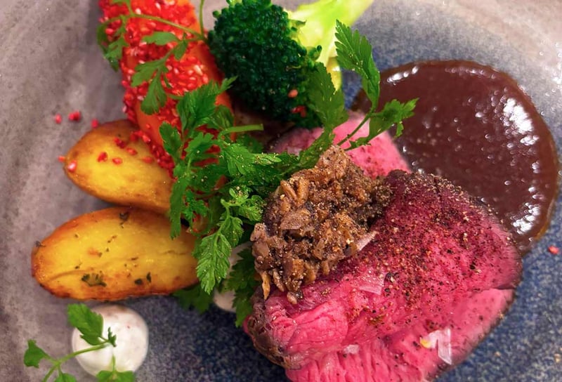 Dining-onboard-AmaWaterways-AmaMora-on-Danube-cruise-steak-and-seasoned-veg-ith-jus-on-the-side---AmaWaterways-AmaMora-Review-May-2026