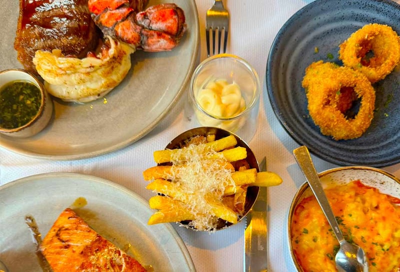 Surf-and-turf-dish-with-salmon-dish-with-sides-at-Candles-onboard-Windstar-Cruises-Star-Pride-Windstar-Star-Pride-Review-Five-Days-from-London-Bridge-to-St.-Malo