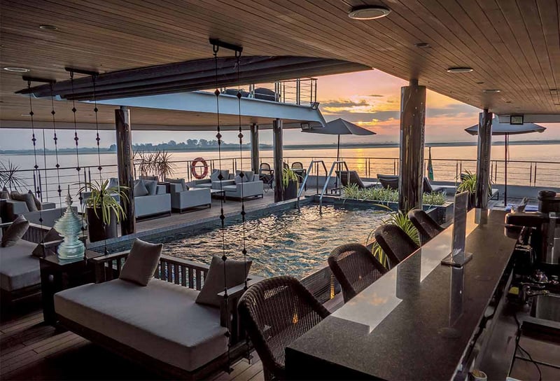 Scenic-Aura-Vitality-Pool-with-Sunset-in-the-background-Scenic-Aura-India-River-Cruising-&-Land-Journeys-2027-2028