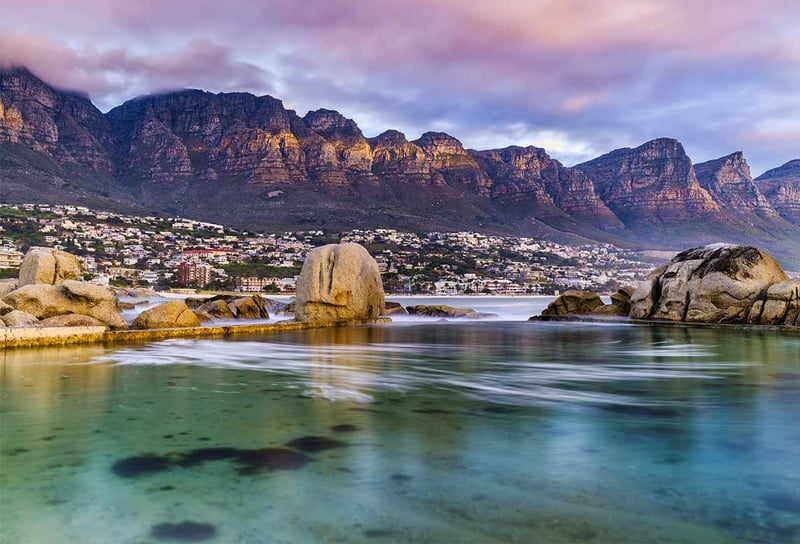 Camps-Bay-and-the-majestic-Twelve-Apostles-mountain-range-Cape-town-South-Africa-and-Cape-Town-Cruises