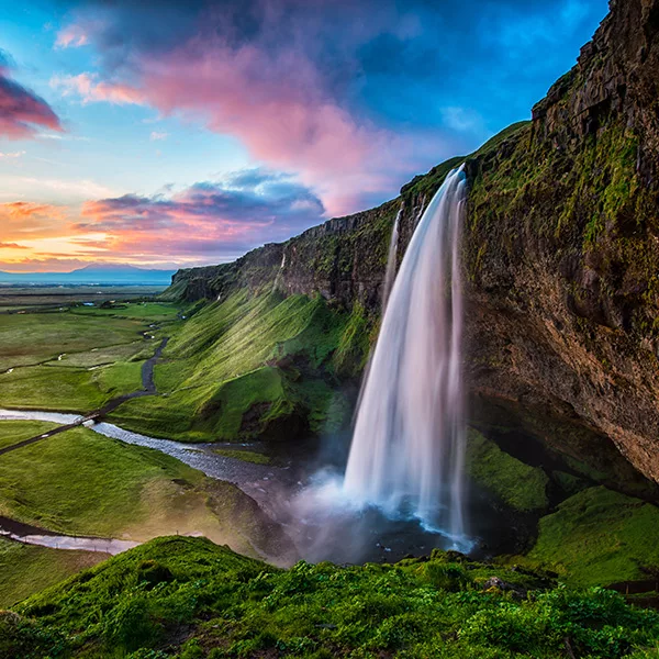 Mesmerizing waterfall in Iceland - 10 Ultimate Bucket List Destinations Revealed by Top Cruise Bloggers