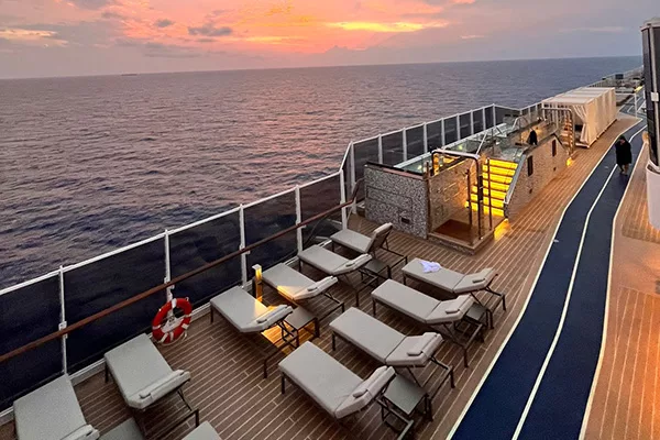 Exlpora I Deck with Caribbean Sunset in the background