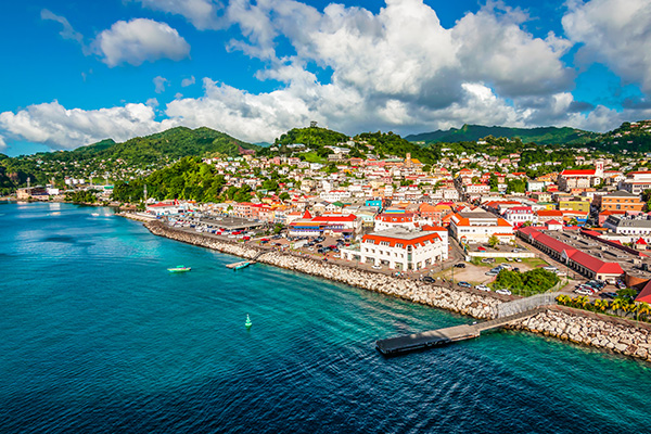 Sunny blue sky with crystal clear seas of Grenada in the Caribbean 